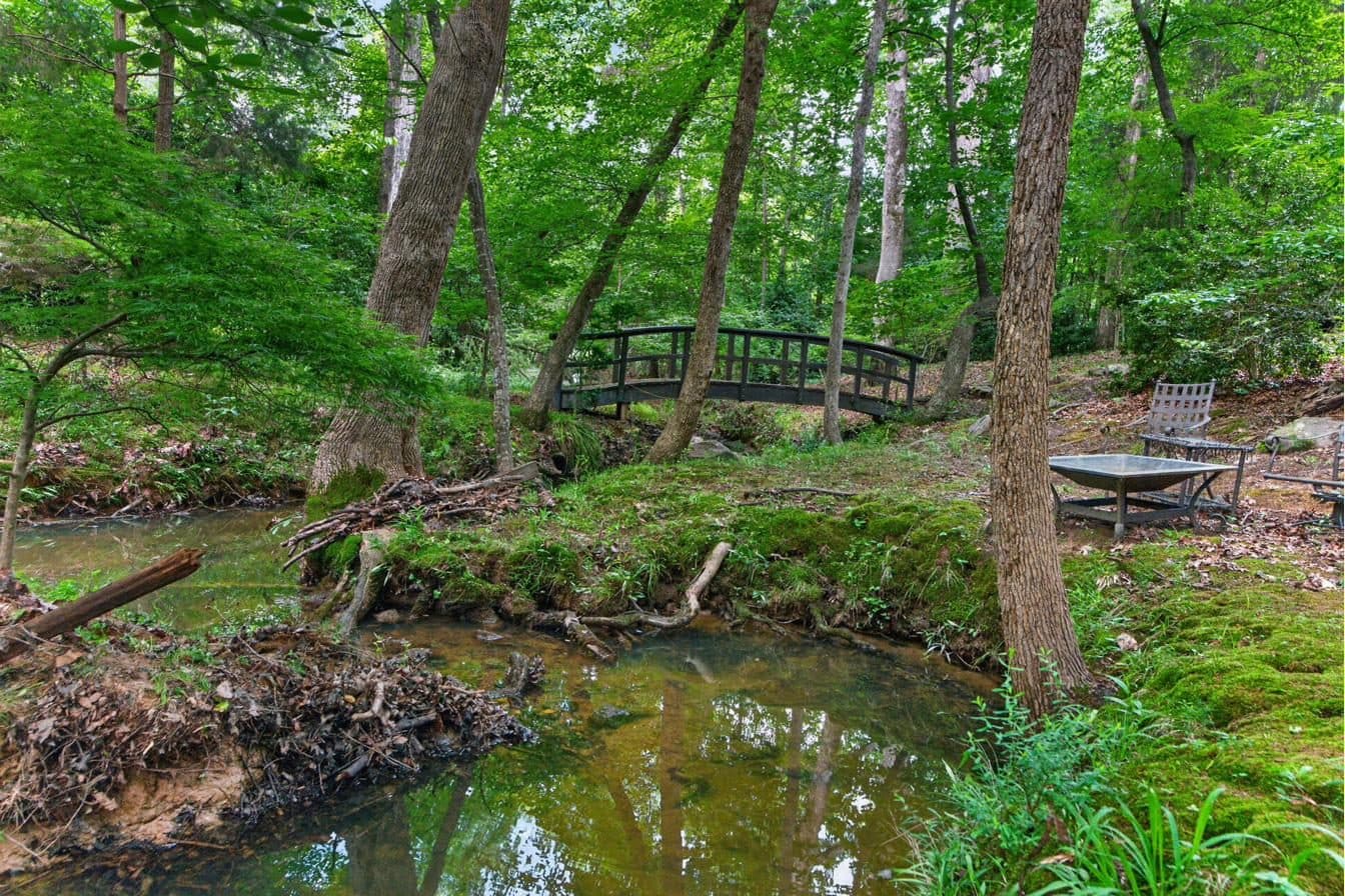 Footbridge spanning the creek on the rear compound parcel