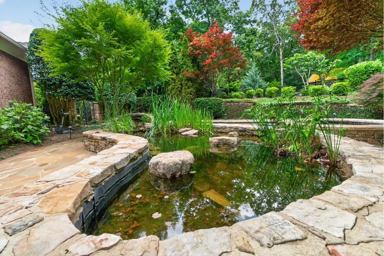 Japanese garden and landscaped beds on the rear compound parcel